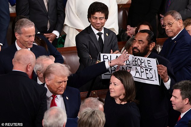 Al Green forcibly removed from Trump's State of the Union over protest sign criticizing AI-generated video