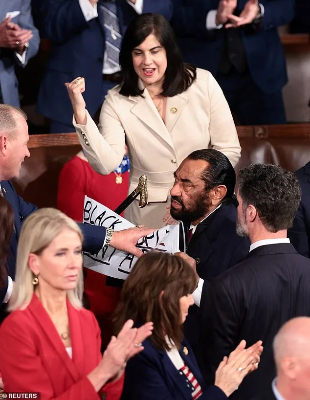 Al Green forcibly removed from Trump's State of the Union over protest sign criticizing AI-generated video