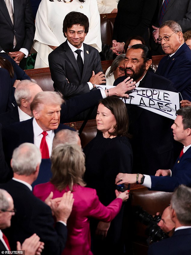 Al Green forcibly removed from Trump's State of the Union over protest sign criticizing AI-generated video