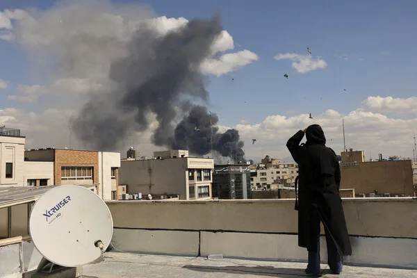 US-Israeli Strike on Iran's Communication Hub Sparks Fears of Regional Conflict