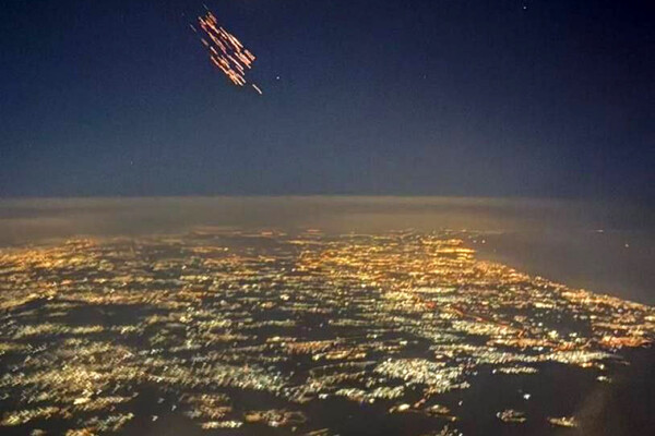 Exclusive Imagery Reveals Iranian 'Horramshahr-4' Ballistic Missile Deploying Cluster Munitions Over Israel