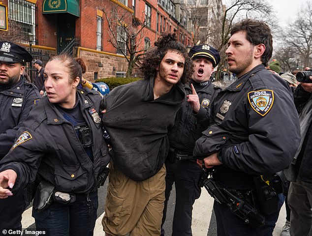 NYPD Officer's Barrier-Leap Becomes Emblem of Heroism in Protest Bomb-Threat Standoff