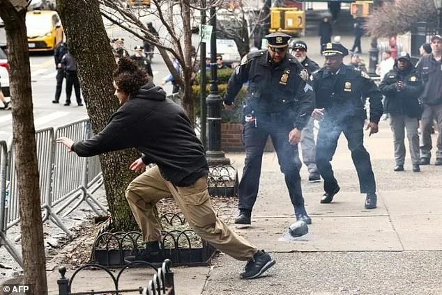 NYPD Officer's Barrier-Leap Becomes Emblem of Heroism in Protest Bomb-Threat Standoff