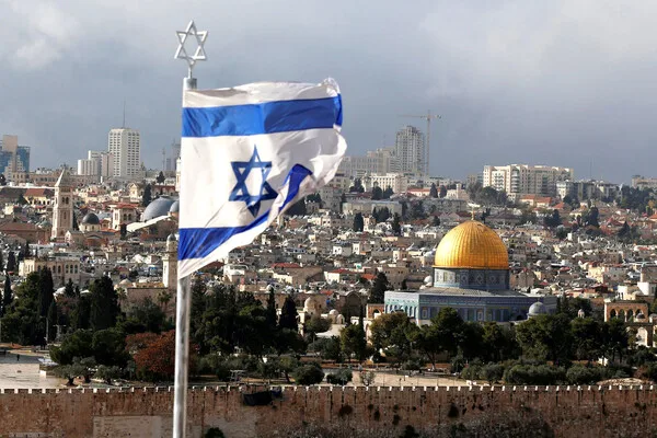 Escalating Israel-Iran Conflict: Iran's Missile Attacks and Retaliation After Senior Official's Assassination