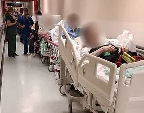 Hospital Patient Forced to Sleep on Corridor: Urgent Need for Bed Crisis Solutions