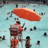 16-Year-Old Muslim Lifeguard Faced Discrimination After Being Fired for Modest Swimsuit Cover-Up, Employer Claims 'Safety Concern' Sparks Debate Over Religious Freedom and Workplace Policies